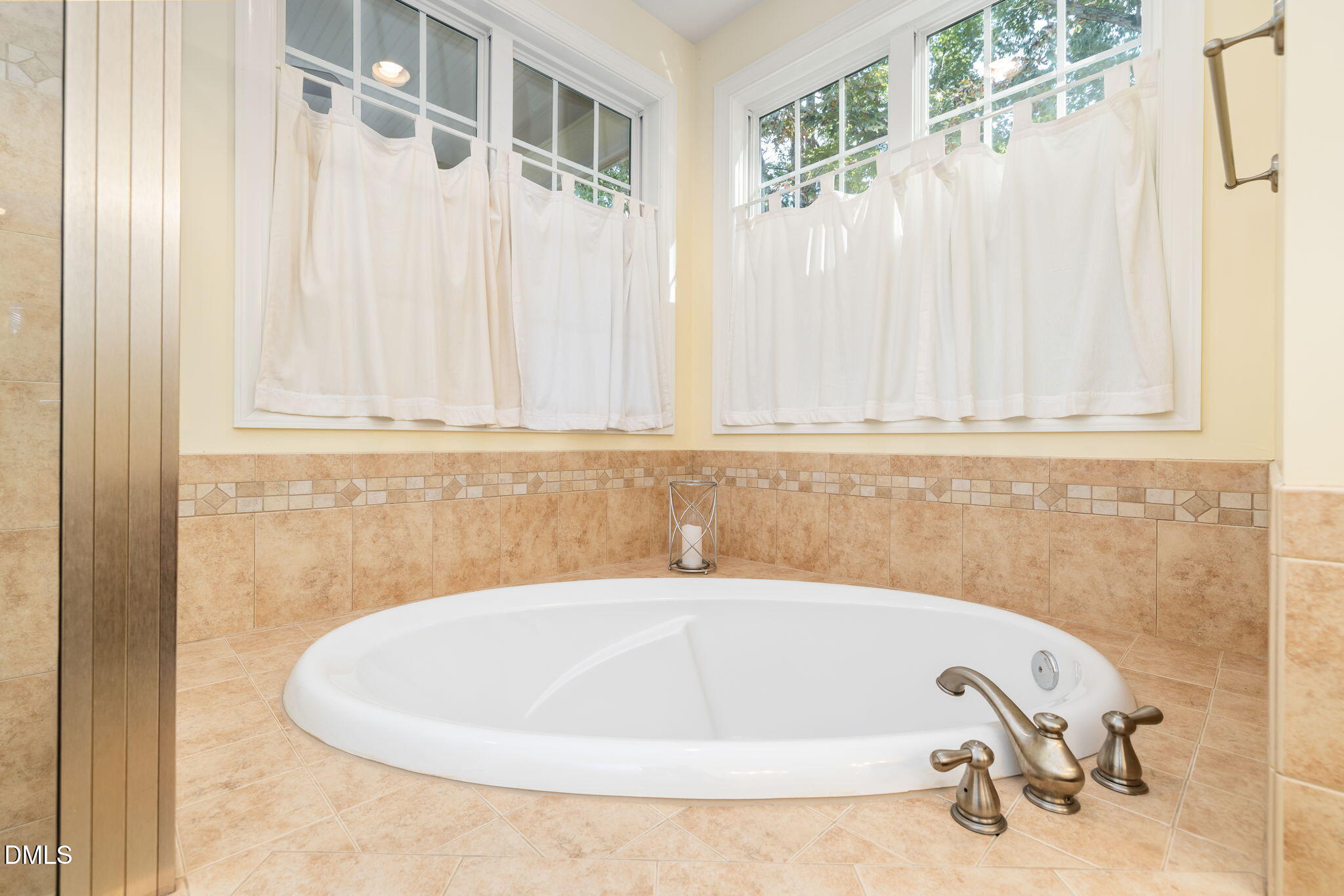 140 Breezewood Road Boydton, VA 23917 - Photo 38 of 87 a bath tub sitting in a bathroom next to a window