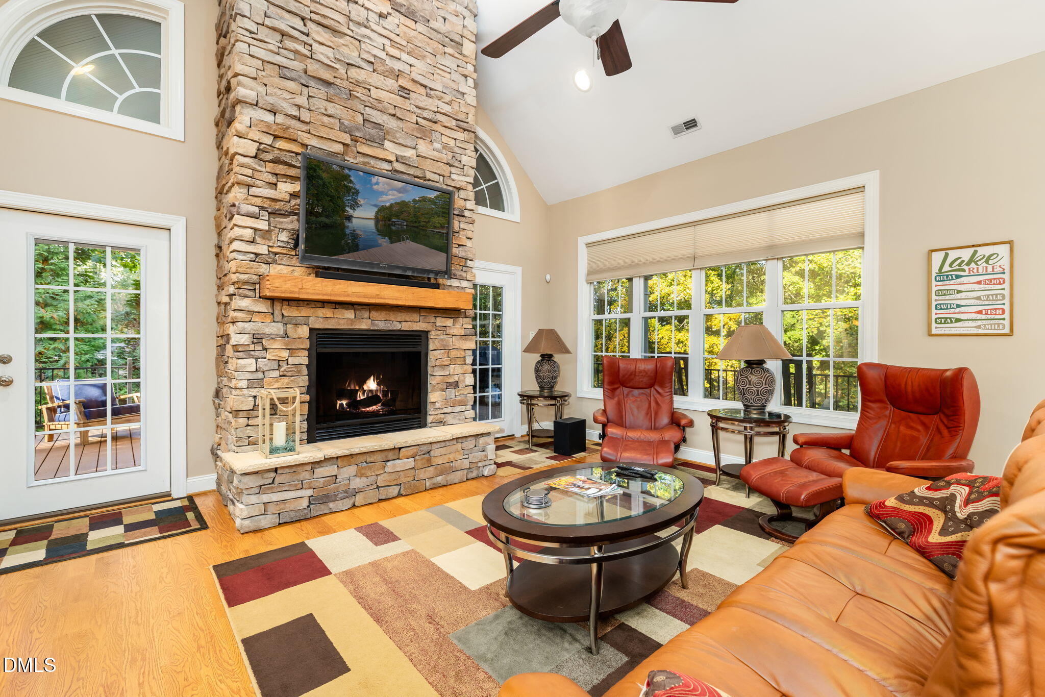 140 Breezewood Road Boydton, VA 23917 - Photo 5 of 87 a living room with furniture a fireplace and a flat screen tv