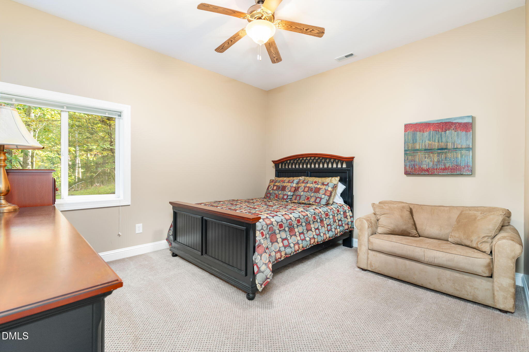 140 Breezewood Road Boydton, VA 23917 - Photo 61 of 87 a bedroom with a bed lamp and window