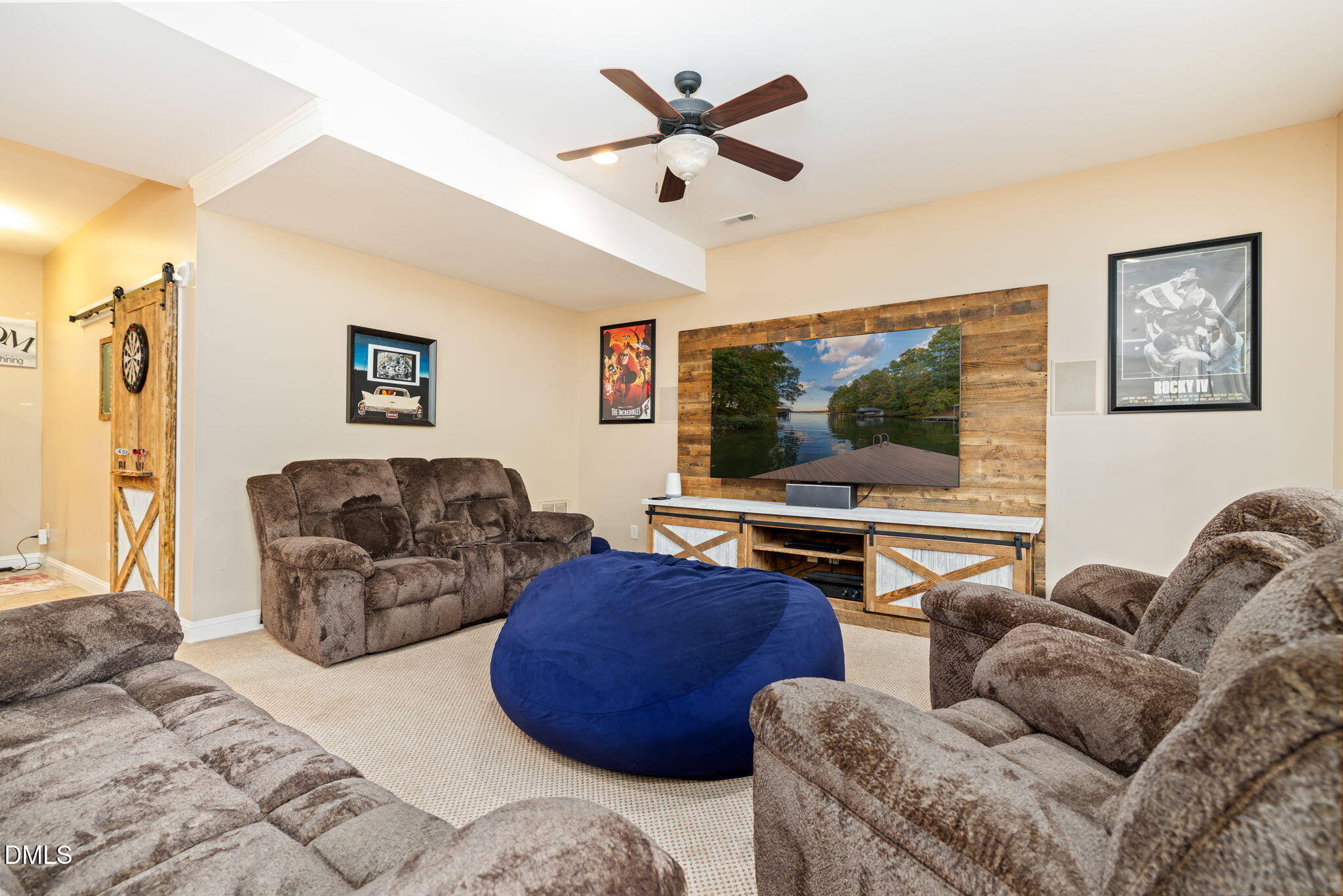 140 Breezewood Road Boydton, VA 23917 - Photo 67 of 87 a living room with furniture and a flat screen tv
