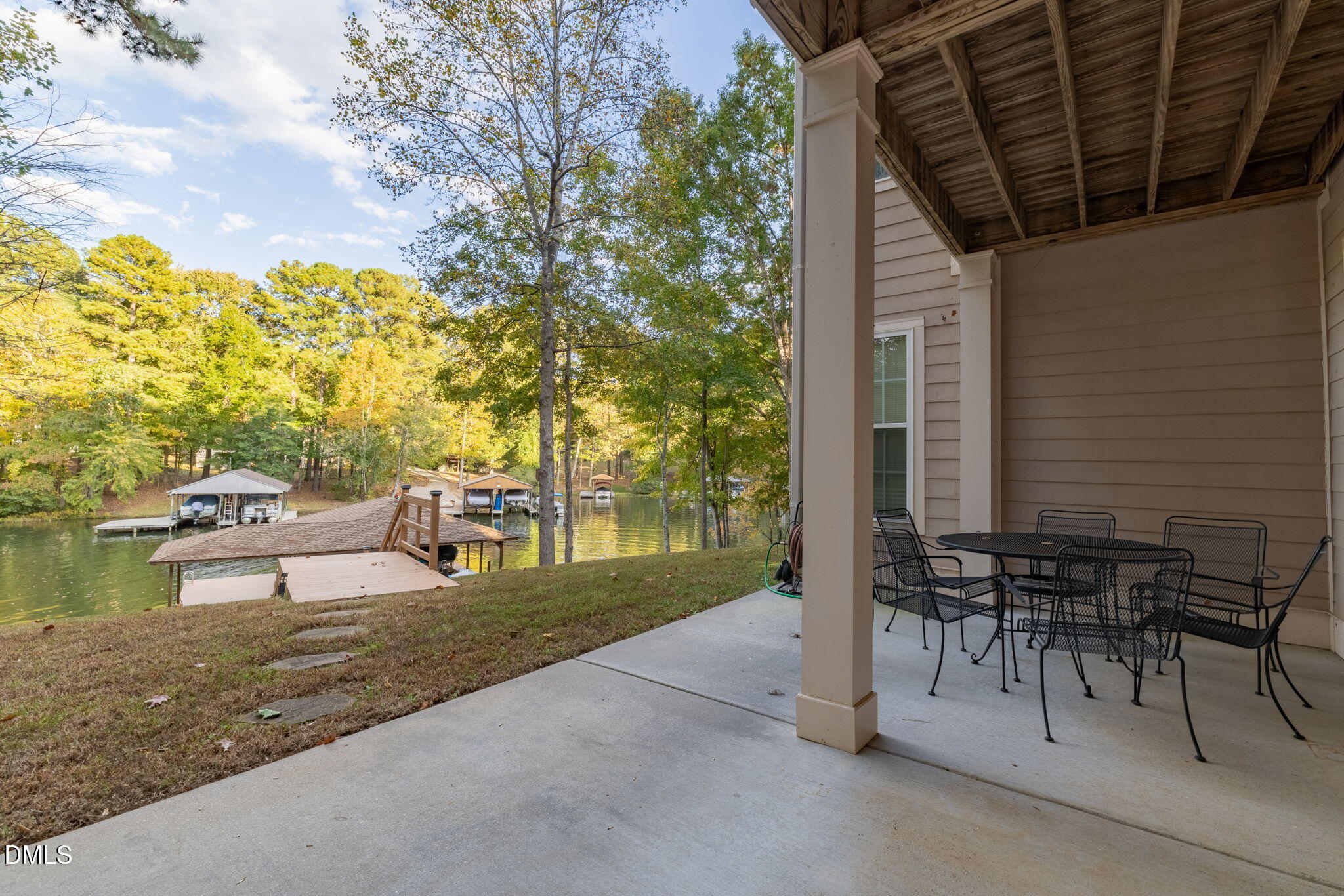 140 Breezewood Road Boydton, VA 23917 - Photo 70 of 87 a view of a patio with table and chairs and potted plants