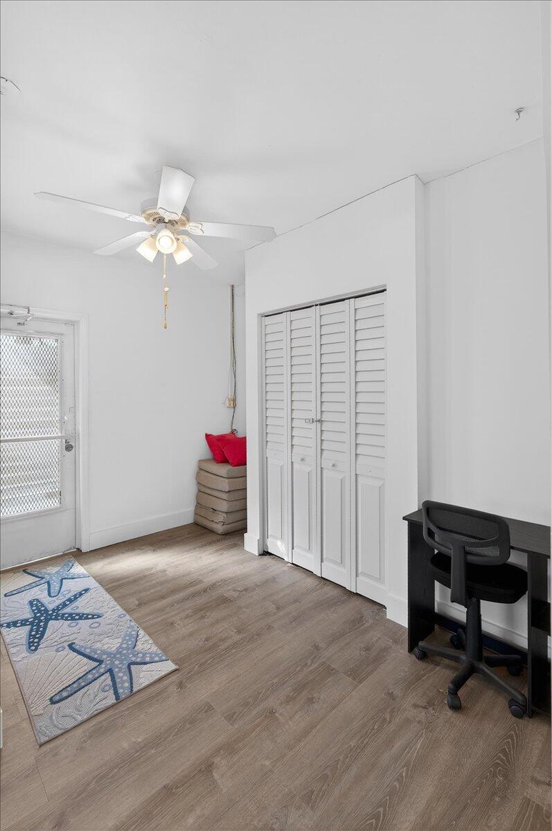 110 Northeast 30th Street Pompano Beach, FL 33064 - Photo 19 of 31 a view of a livingroom with furniture and a chandelier