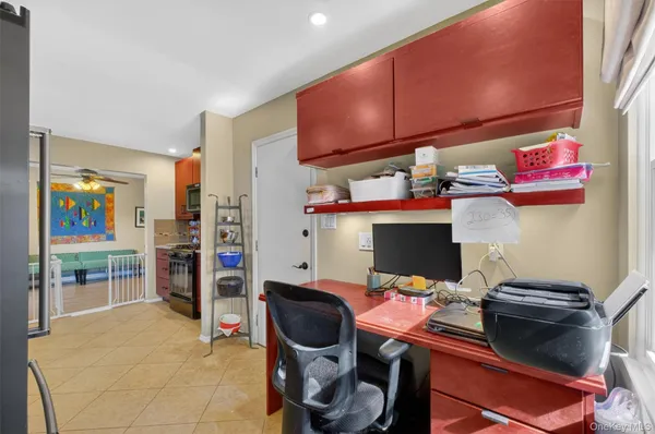 a room with furniture and a flat screen tv