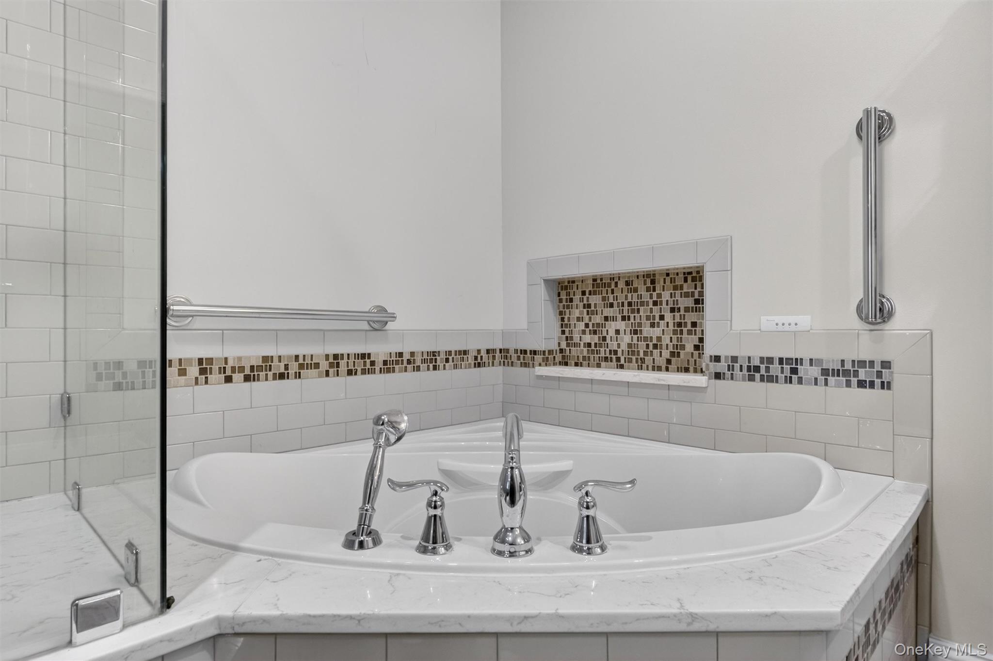 42 Larch Court Fishkill, NY 12524 - Photo 20 of 29 a bath tub sitting next to a bathroom