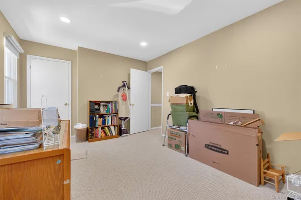 a room with a wooden floor and furniture