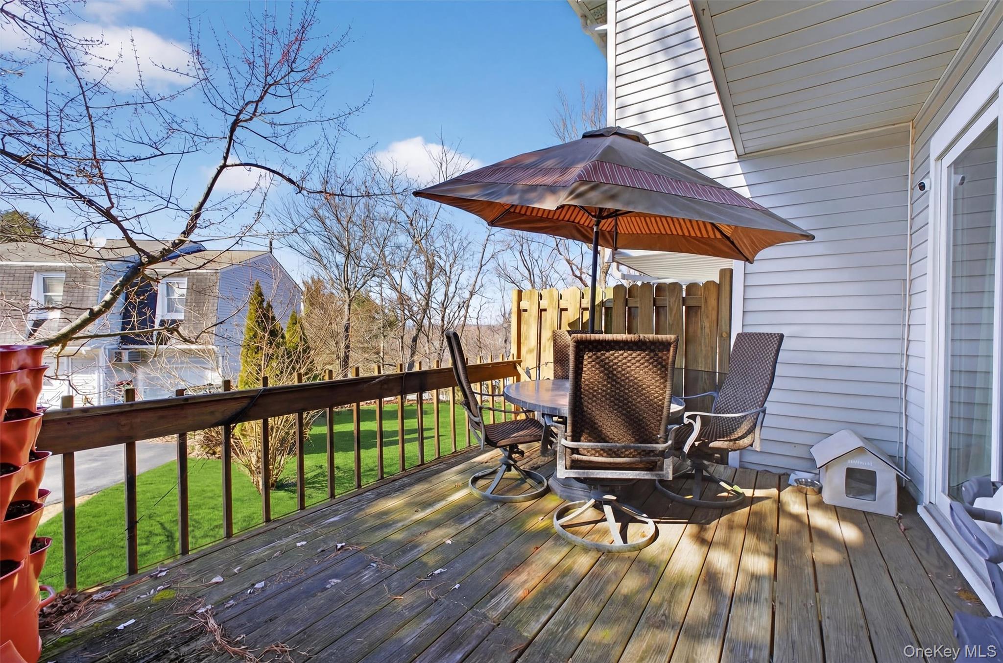 42 Larch Court Fishkill, NY 12524 - Photo 23 of 29 a view of balcony with wooden floor and outdoor seating