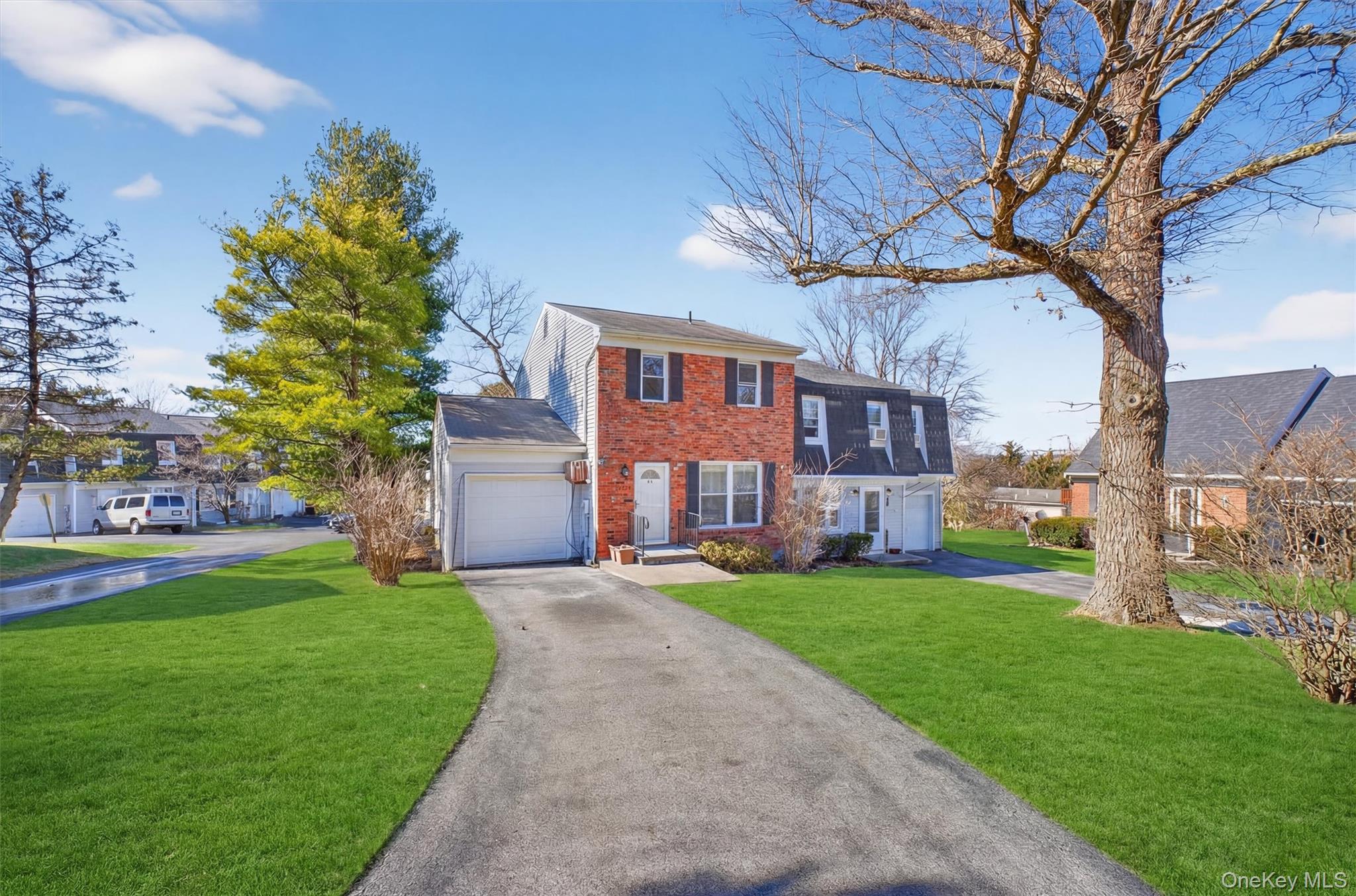 42 Larch Court Fishkill, NY 12524 - Photo 27 of 29 a view of a big yard next to a building