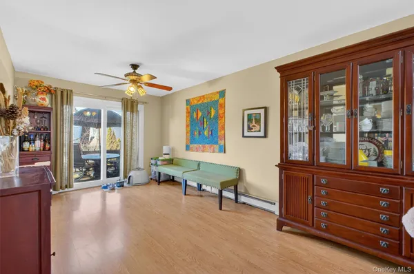 a spacious bedroom with a large bed and a window