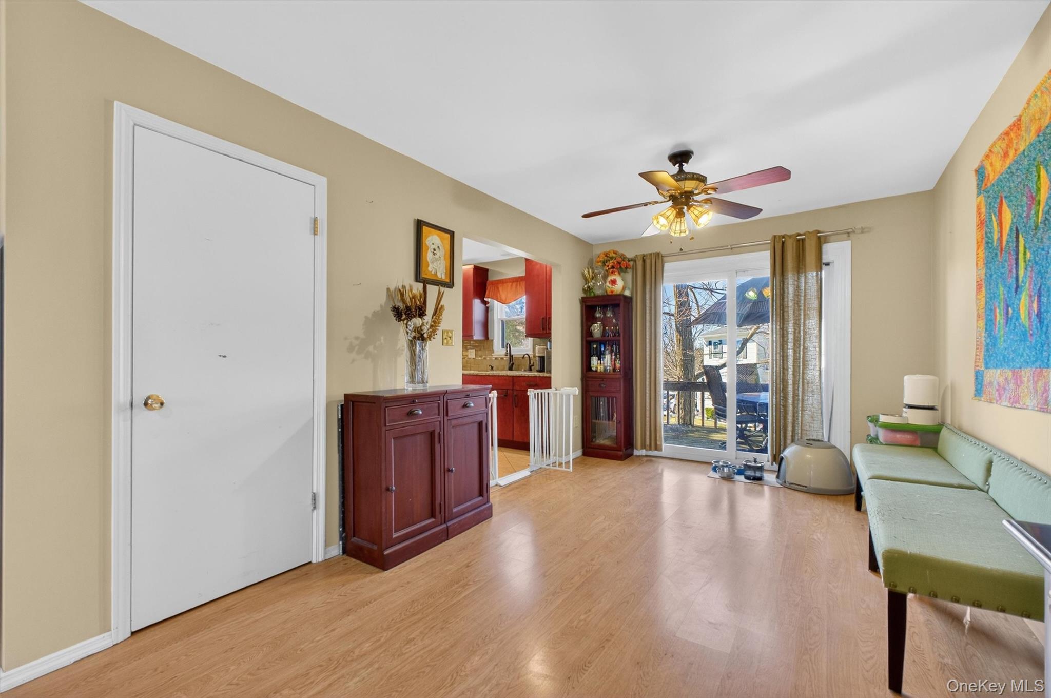 42 Larch Court Fishkill, NY 12524 - Photo 8 of 29 a living room with furniture and a chandelier