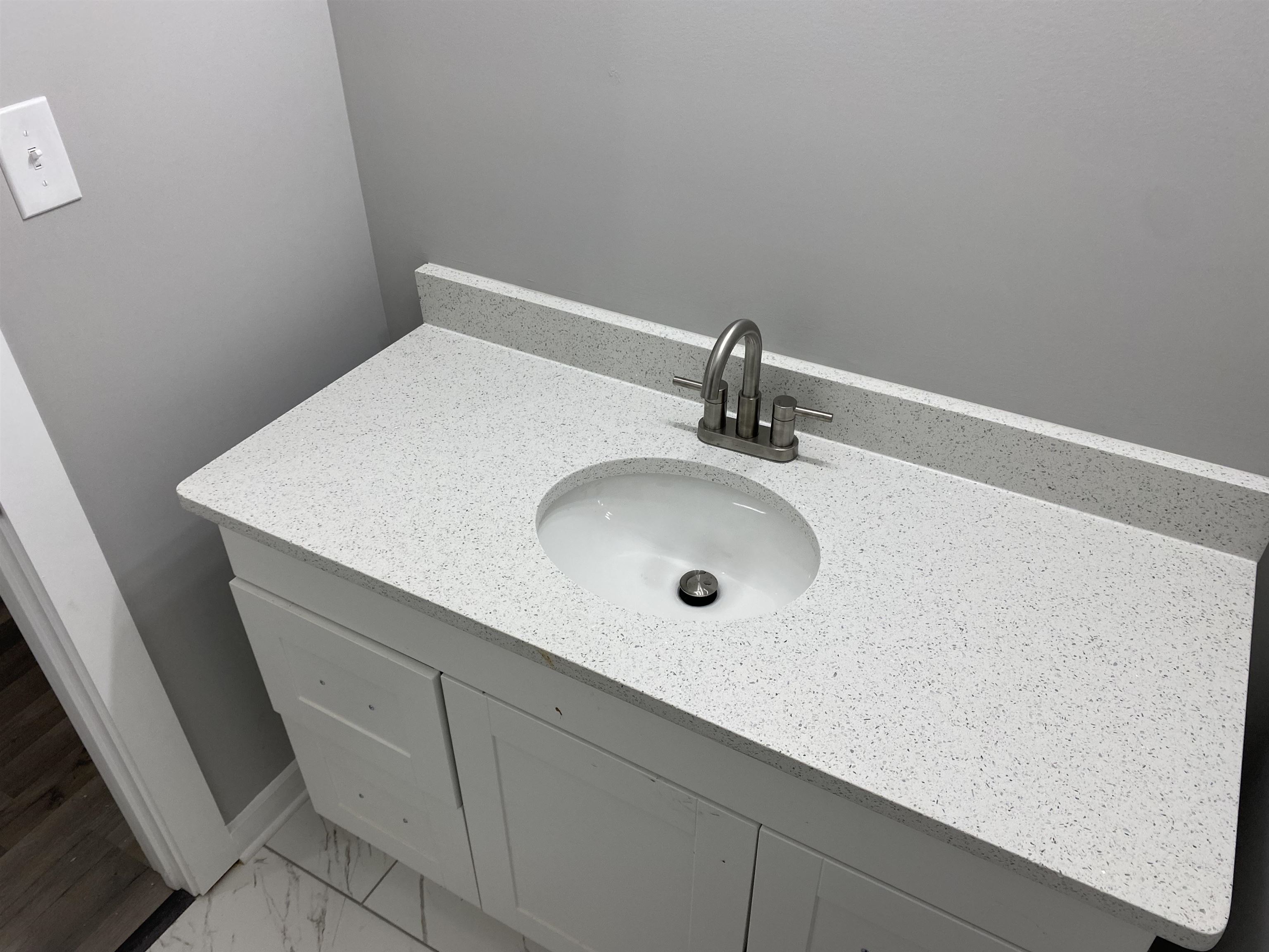 2352 Manchester Road Memphis, TN 38114 - Photo 15 of 36 a bathroom with a sink and a mirror