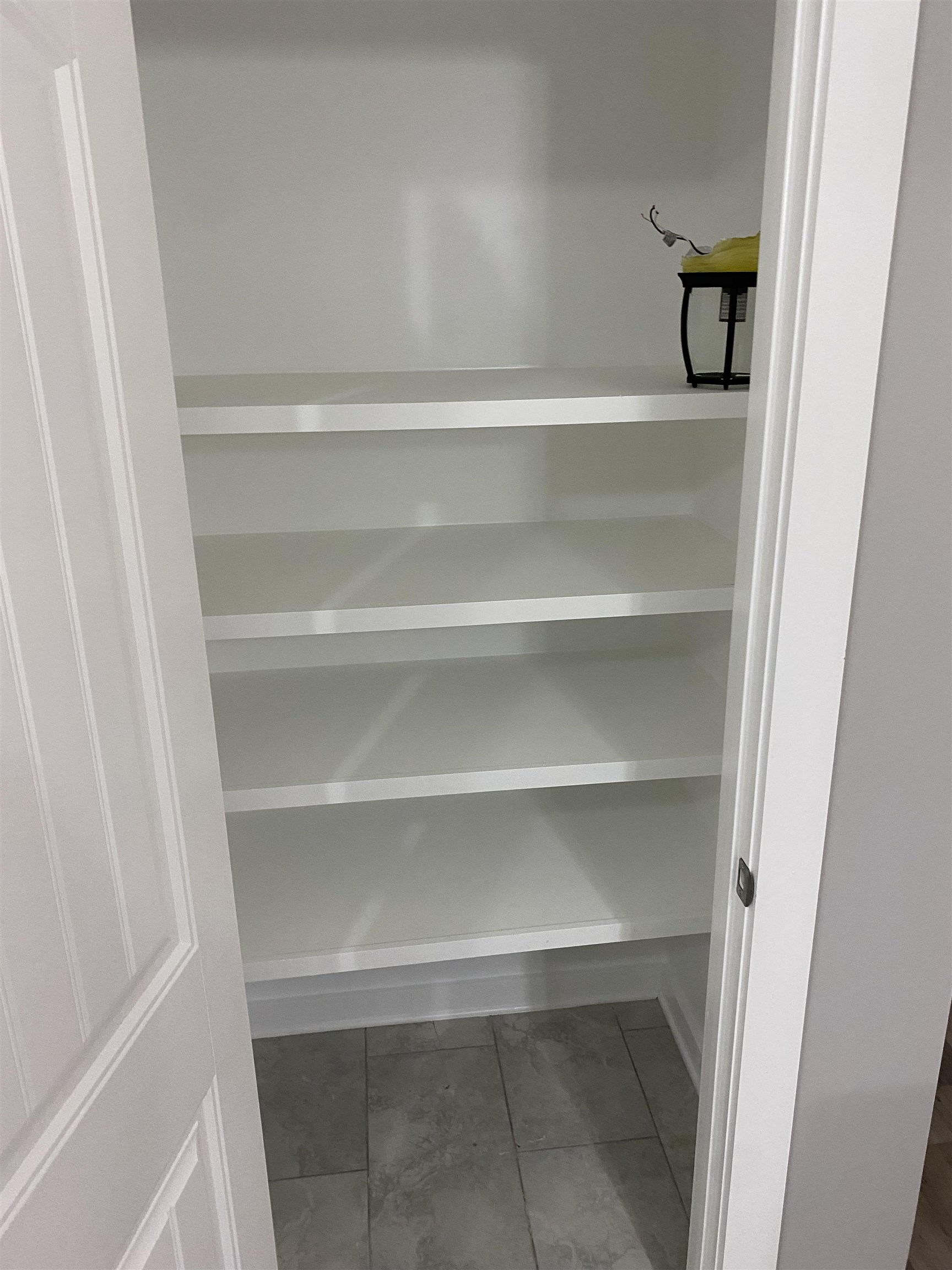 2352 Manchester Road Memphis, TN 38114 - Photo 16 of 36 a view of walk in closet with empty racks