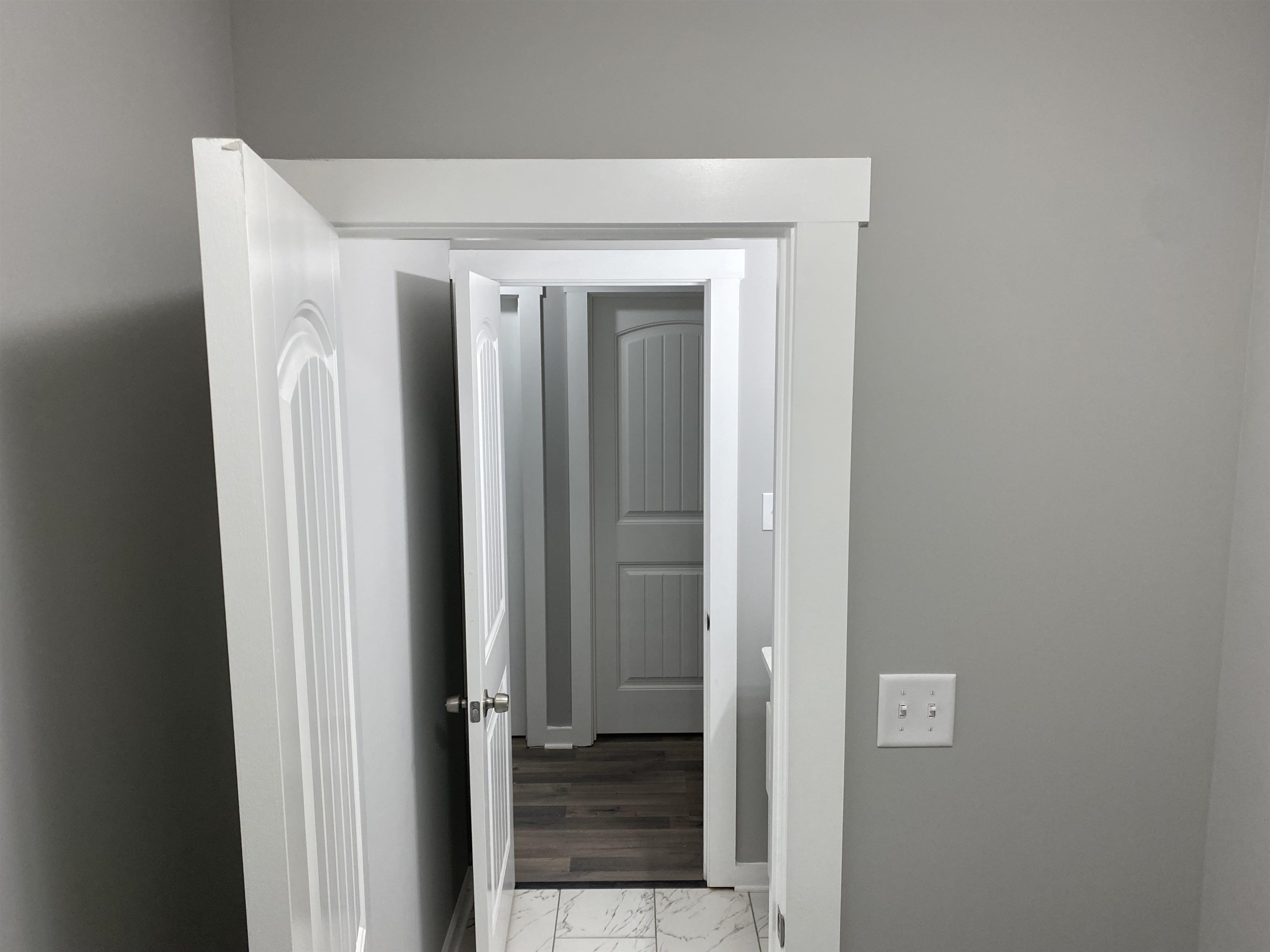 2352 Manchester Road Memphis, TN 38114 - Photo 17 of 36 a view of a hallway with wooden shelves