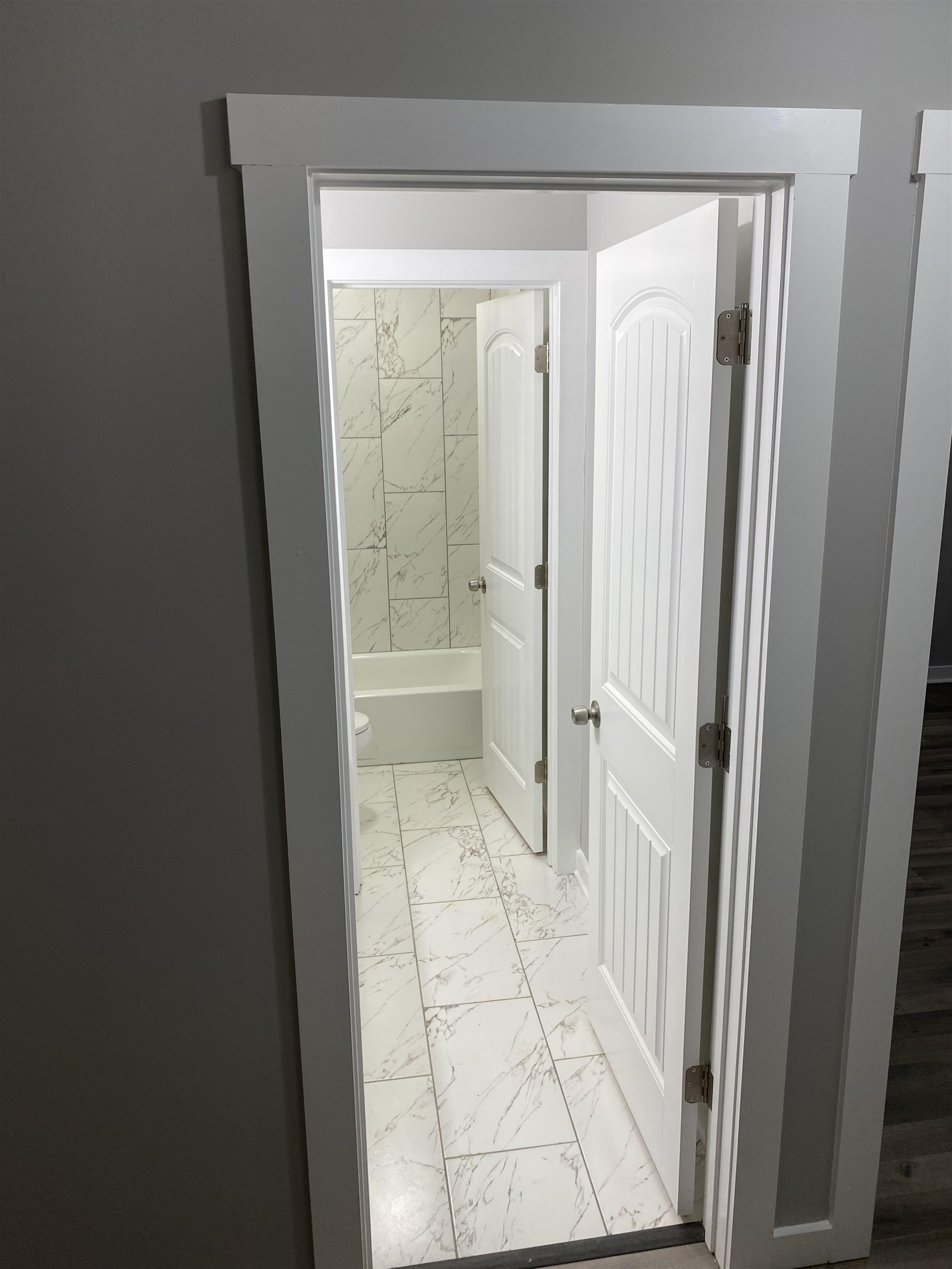 2352 Manchester Road Memphis, TN 38114 - Photo 8 of 36 a view of a bathroom with a glass door
