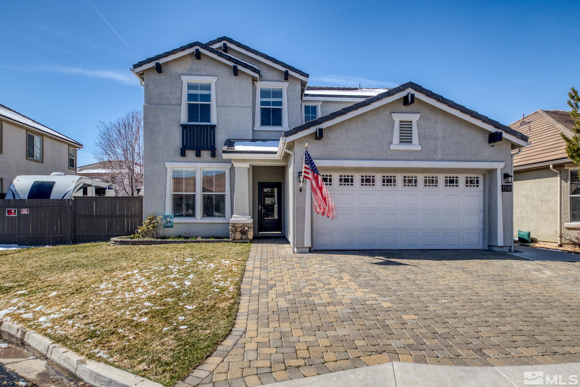 596 Needles Court Reno, NV 89521 - Photo 1 of 40 a view of a house with a yard