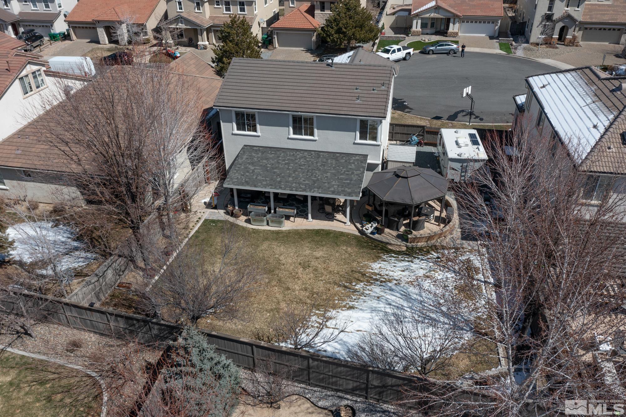 596 Needles Court Reno, NV 89521 - Photo 31 of 40 an aerial view of a house with a yard and sitting area
