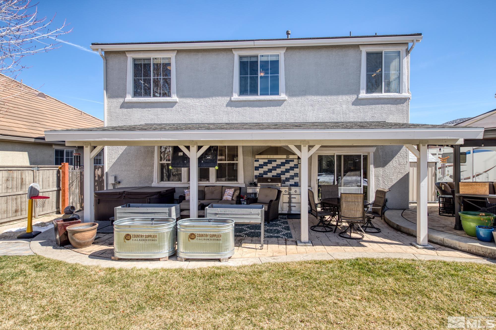 596 Needles Court Reno, NV 89521 - Photo 35 of 40 a view of a house with patio
