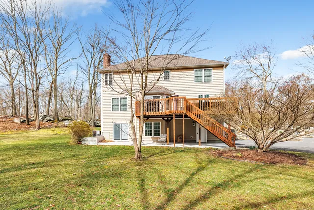 a front view of a house with swimming pool