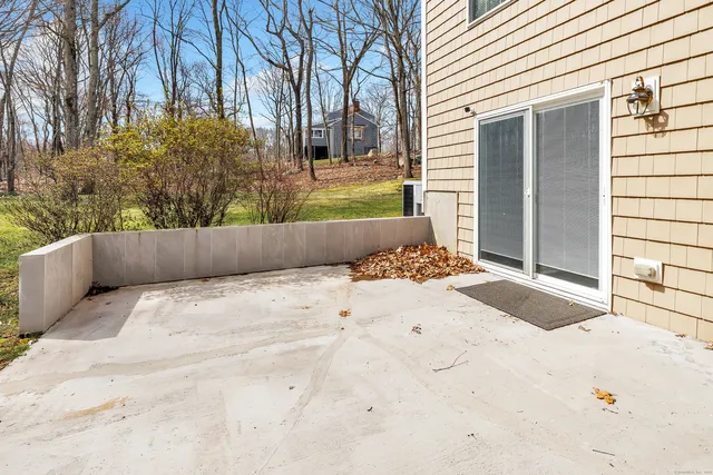 a view of a backyard of the house