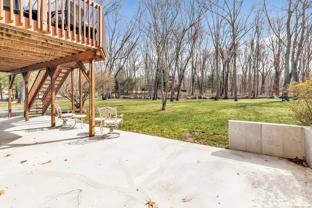 a view of a yard with a fountain