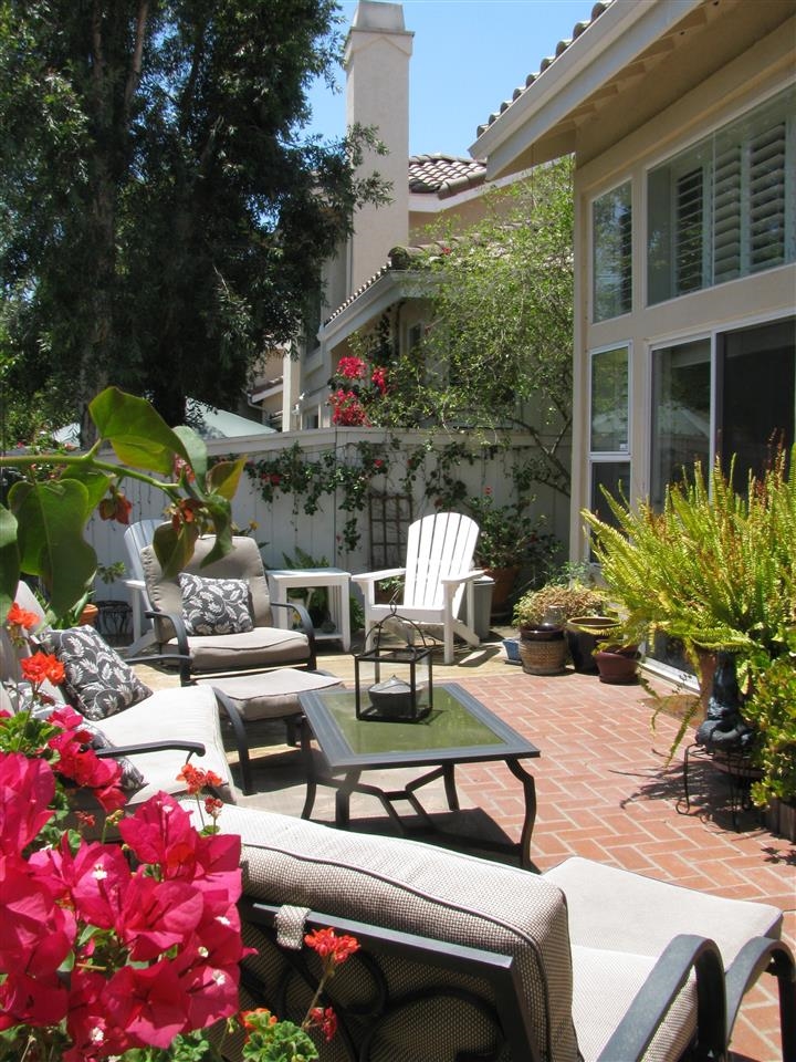 1834 Key Largo Road Vista, CA 92081 - Photo 1 of 25 Delightful back patio offers privacy, color and a great space to entertain!