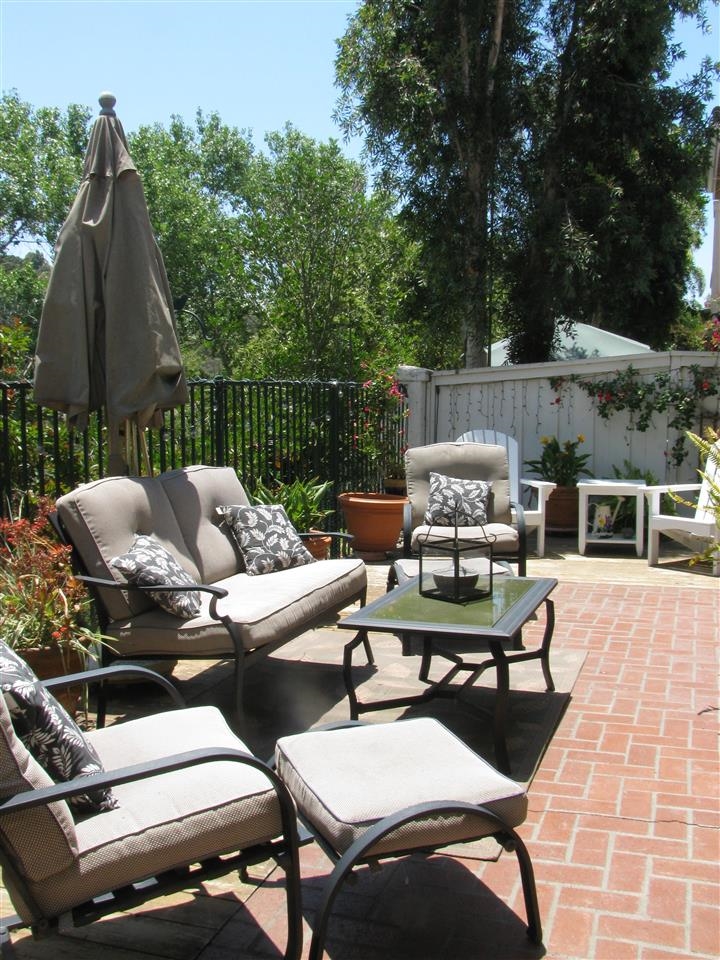 1834 Key Largo Road Vista, CA 92081 - Photo 13 of 25 Very rarely do you find a townhome with this spacious backyard patio! Room to entertain, dine AND plant your favorite herbs or flowers...
