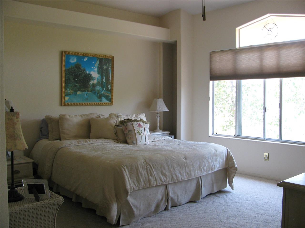 1834 Key Largo Road Vista, CA 92081 - Photo 17 of 25 Well lit and spacious Master bedroom with views to the nature behind you~
