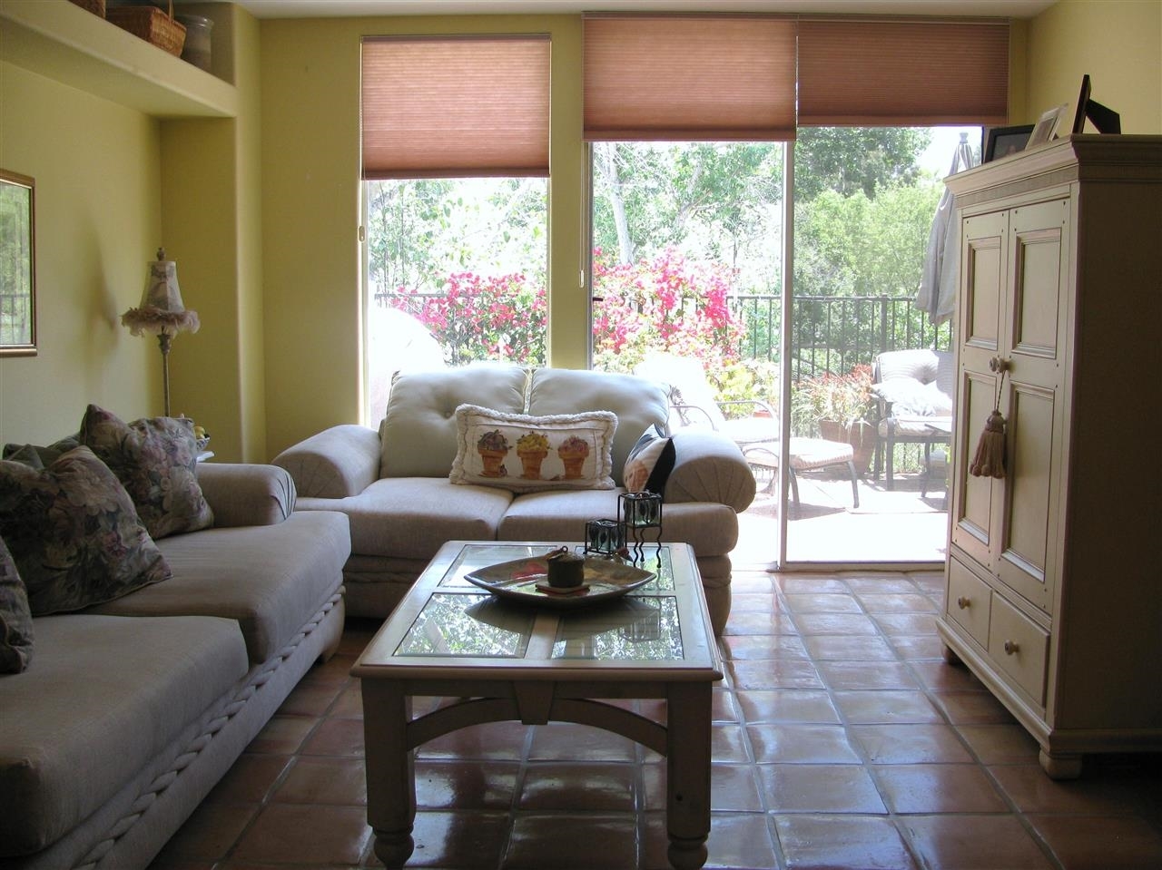 1834 Key Largo Road Vista, CA 92081 - Photo 7 of 25 Standing at the kitche counter and looking into charming & cozy family room with another set of sliding glass doors that lead to private patio~