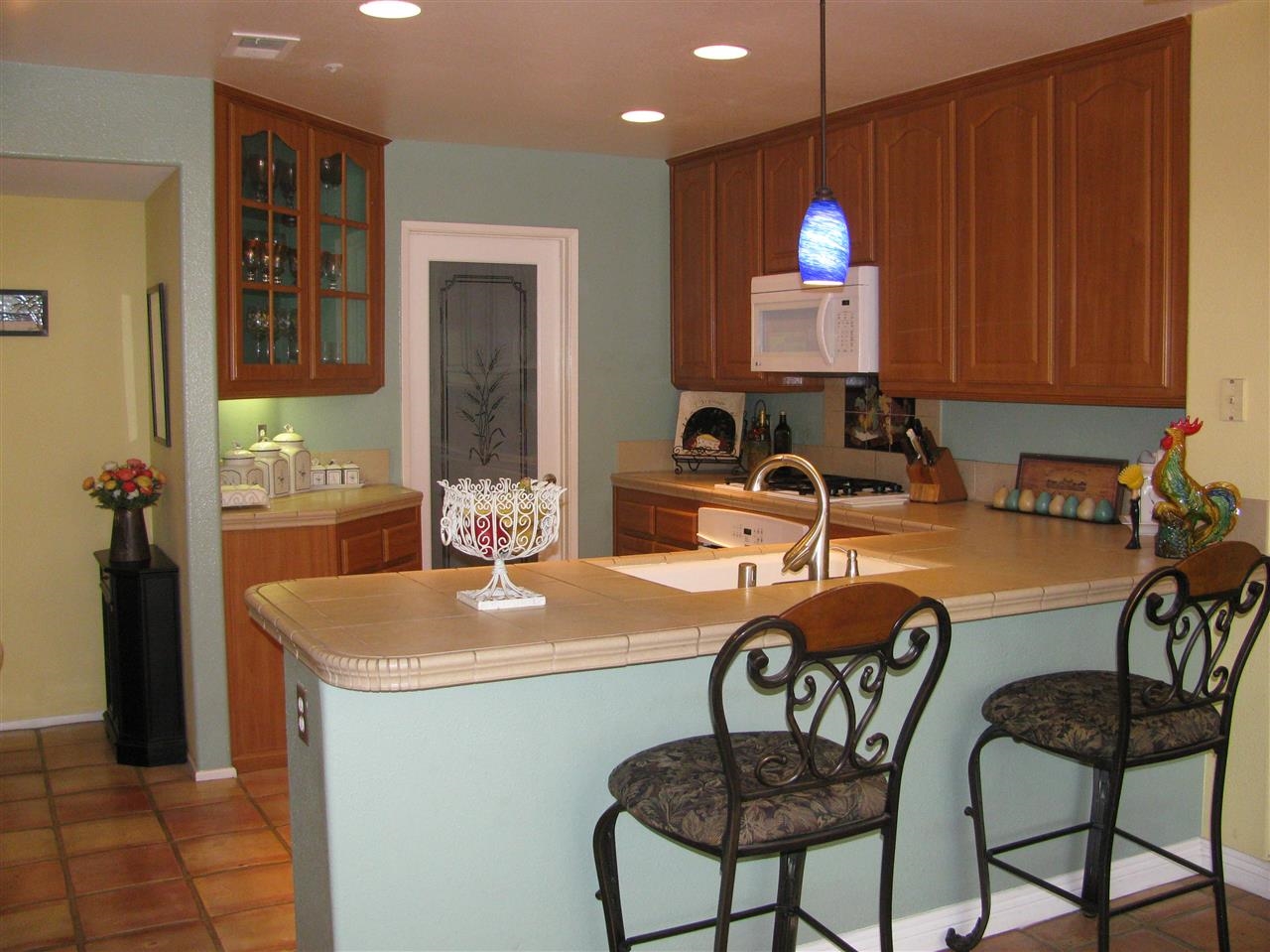 1834 Key Largo Road Vista, CA 92081 - Photo 9 of 25 This kitchen awaits you and is perfectly suited for TWO to be at work preparing a fine meal! Plenty of room for three if need be but who wants three cooks in the kitchen at once???