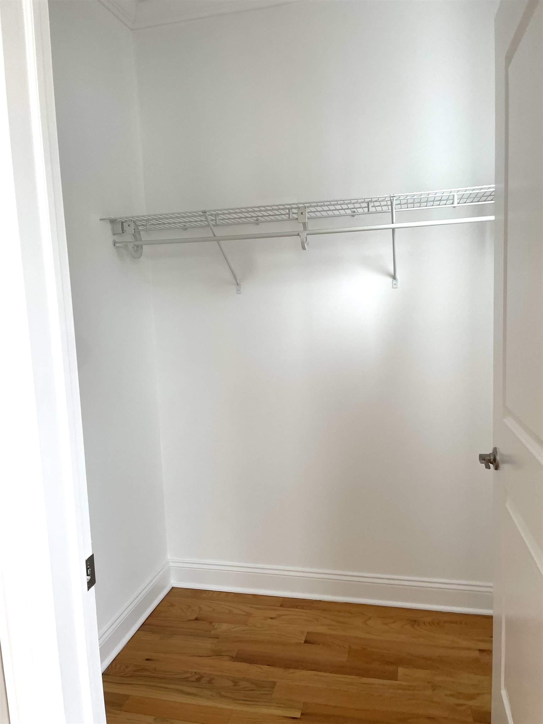 734 County Avenue, Unit A1 Secaucus, NJ 07094 - Photo 11 of 19 a view of a room with racks on the wall