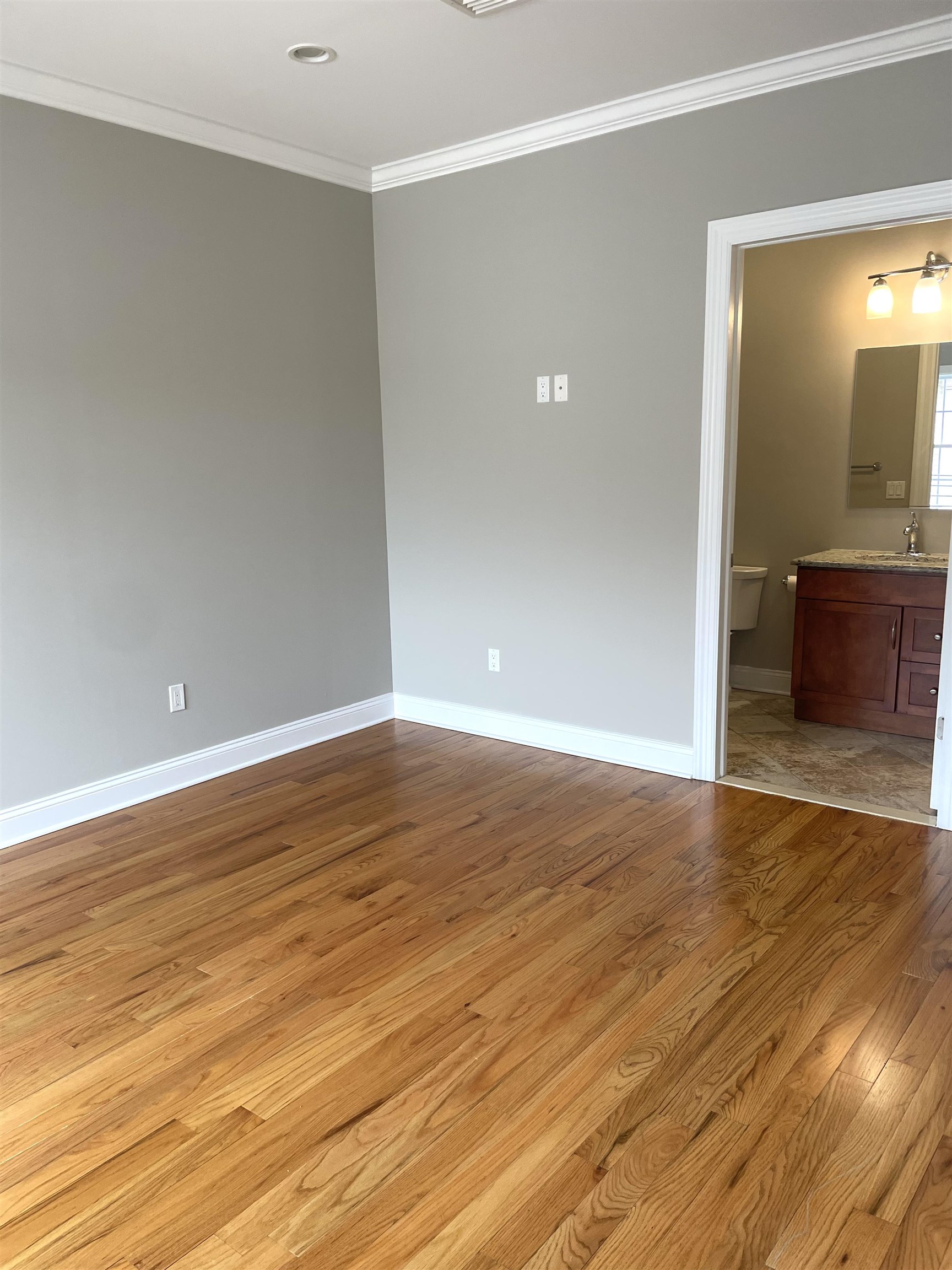 734 County Avenue, Unit A1 Secaucus, NJ 07094 - Photo 12 of 19 a view of room with wooden floor