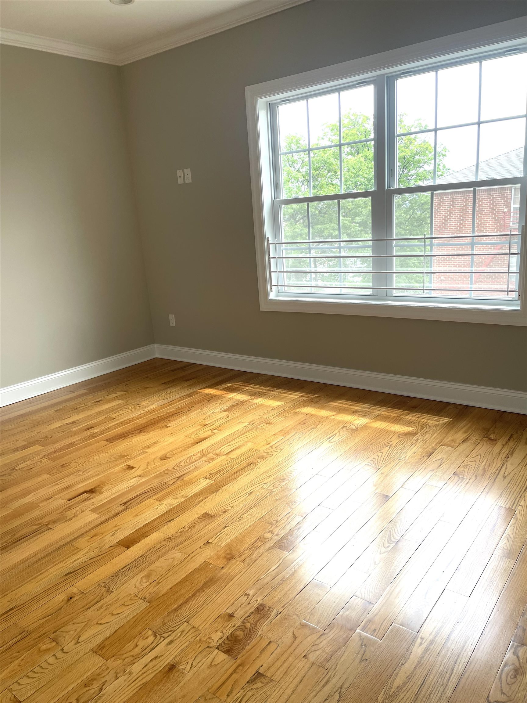 734 County Avenue, Unit A1 Secaucus, NJ 07094 - Photo 14 of 19 a view of an empty room and window
