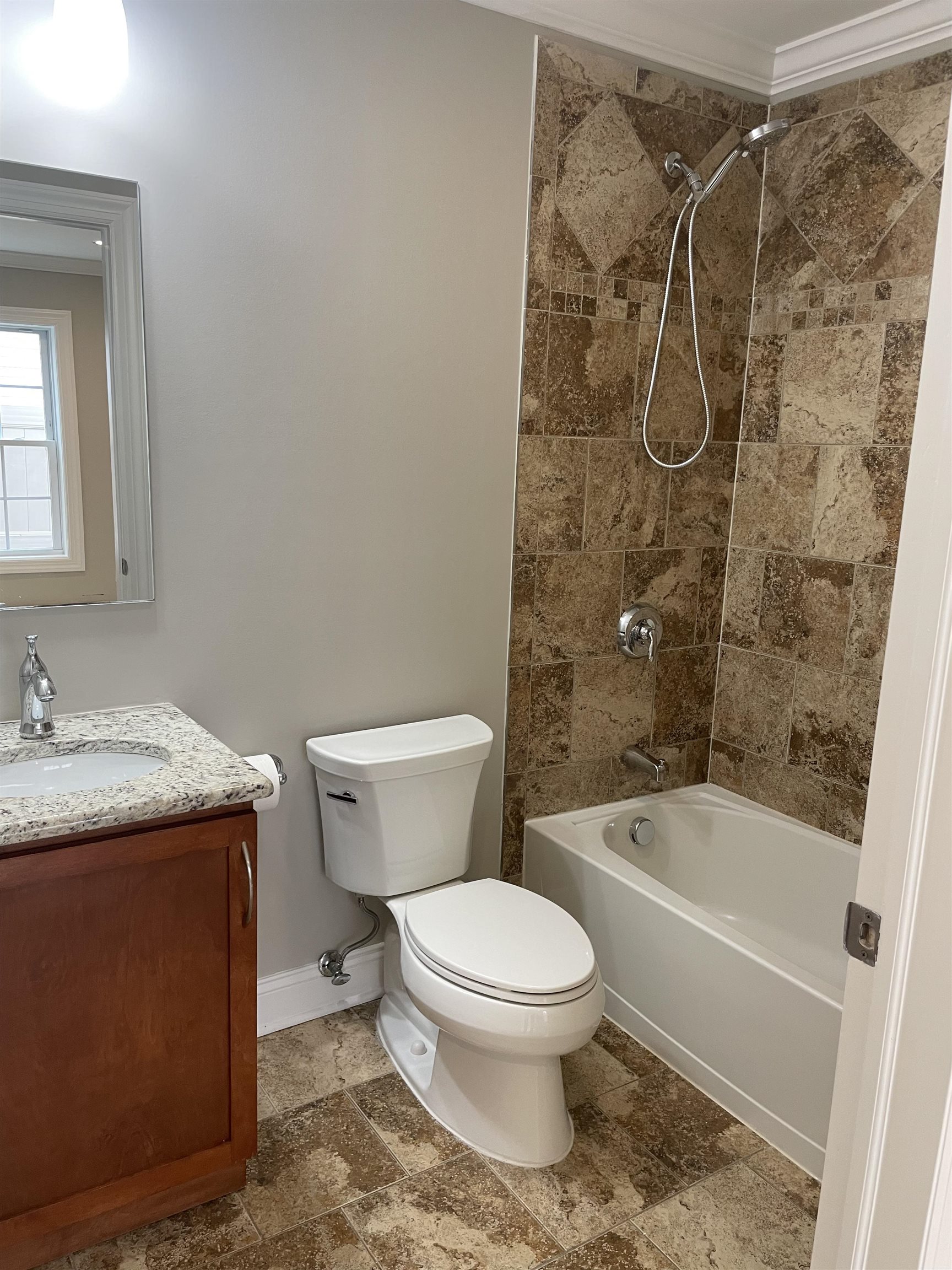 734 County Avenue, Unit A1 Secaucus, NJ 07094 - Photo 18 of 19 a white toilet sitting next to a bath tub