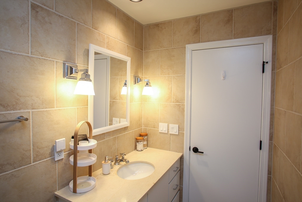 23 Cross Road Alford, MA 01230 - Photo 21 of 37 a bathroom with a sink and a mirror