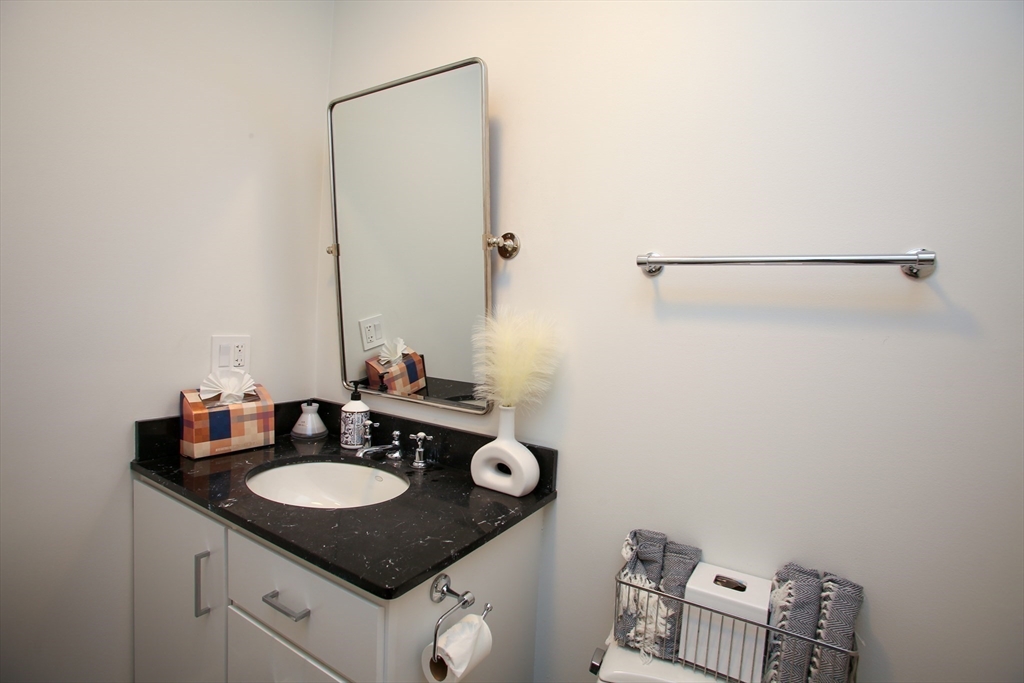 23 Cross Road Alford, MA 01230 - Photo 28 of 37 a sink vanity and mirror