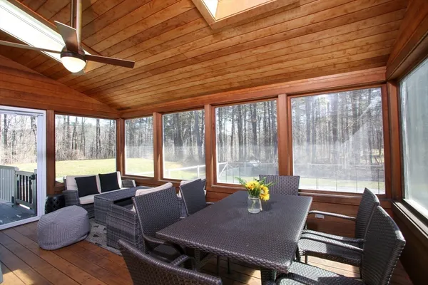 a view of a swimming pool with a lounge chair
