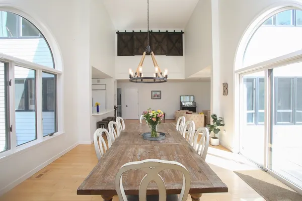a view of a dining room with furniture
