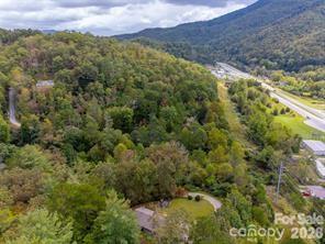 179 Fresh Water Rdg Road Whittier, NC 28789 - Photo 47 of 48 a view of a forest with a houses