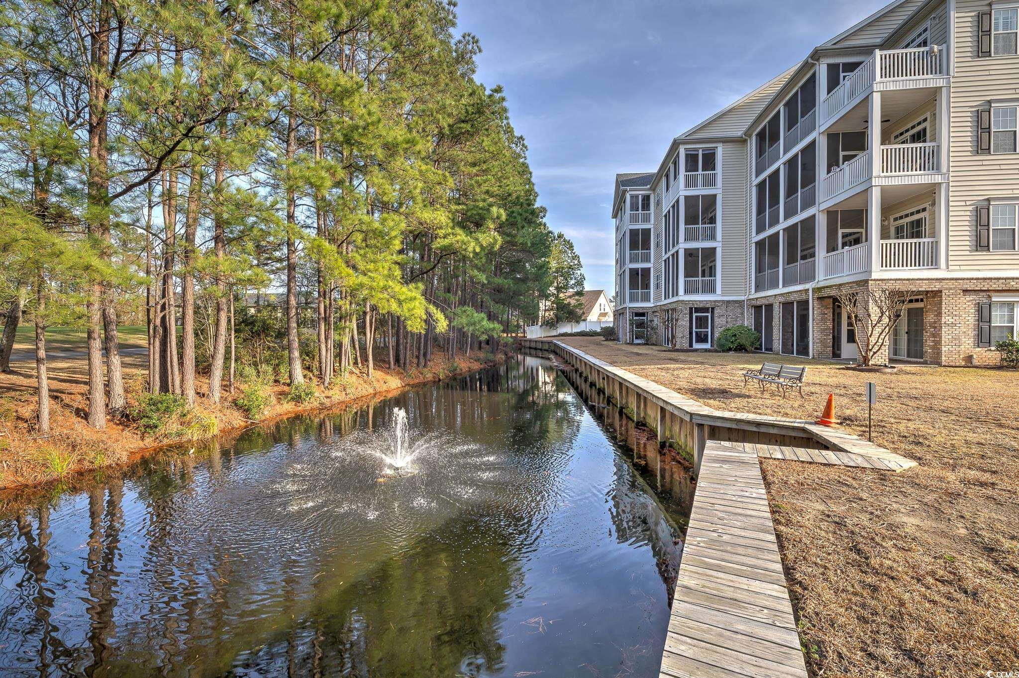 719 Shearwater Court, Unit 303 Murrells Inlet, SC 29576 - Photo 4 of 20 Dock area with a water view
