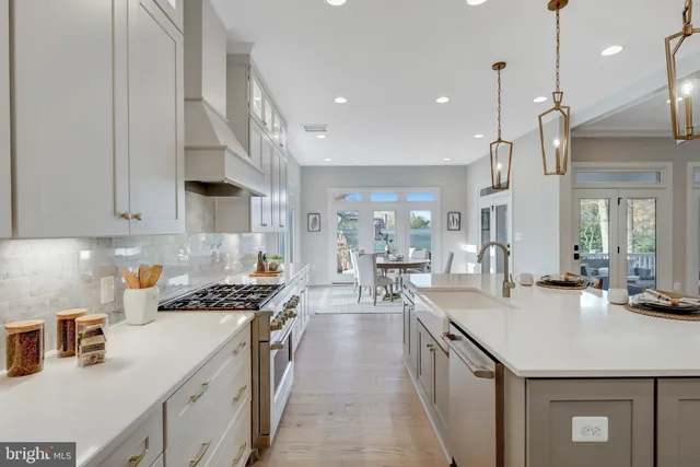 a bathroom with a shower sink double and mirror