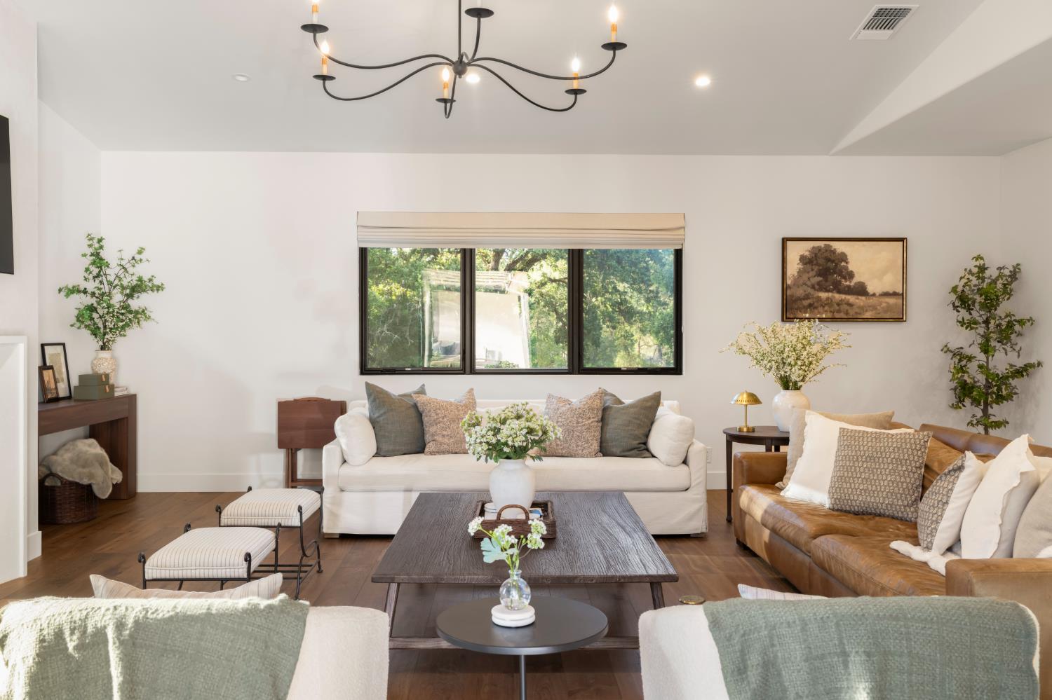 7697 Horseshoe Bar Road Loomis, CA 95650 - Photo 17 of 76 a living room with furniture and a large window
