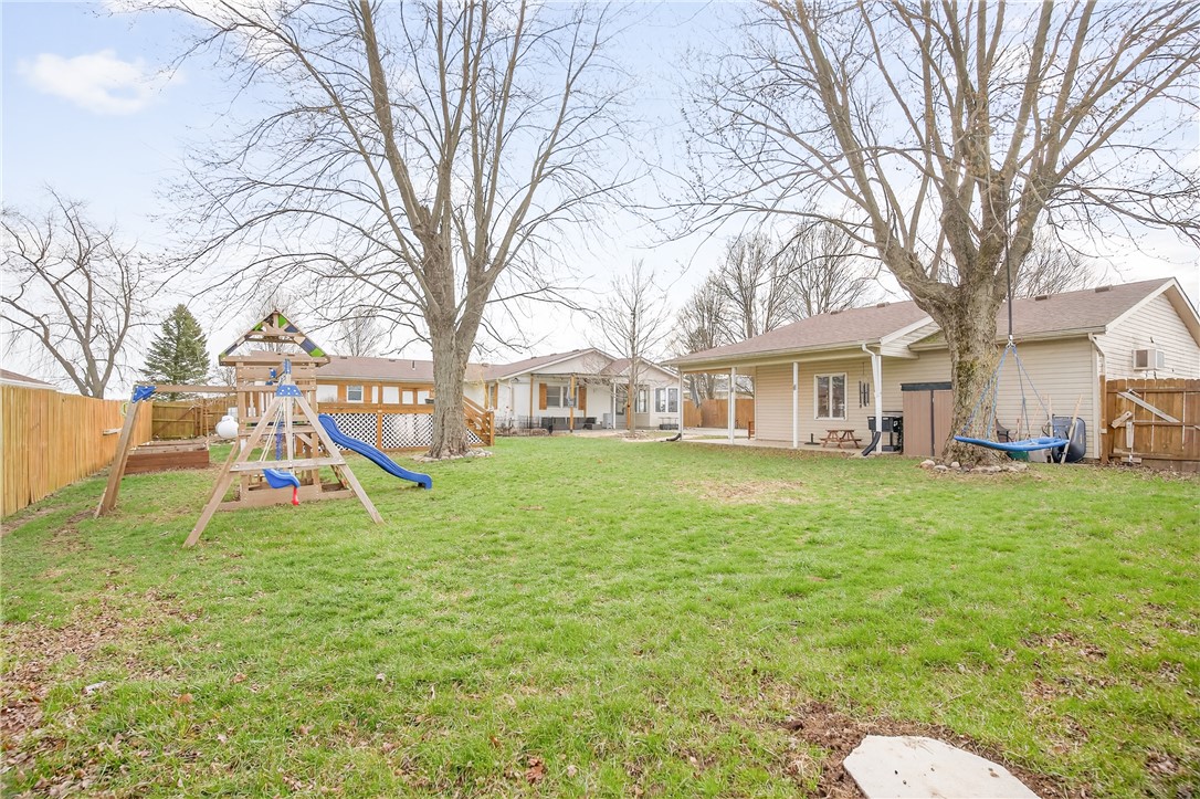 7888 Darke-Preble County Line Road Arcanum, OH 45304 - Photo 44 of 51 This spacious backyard offers a perfect setting for relaxation and outdoor enjoyment.