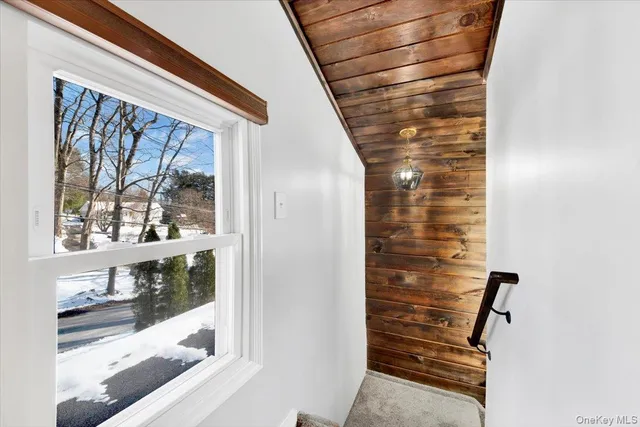a view of livingroom with window and a ceiling fan
