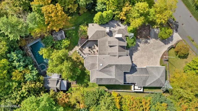 an aerial view of a house with a garden
