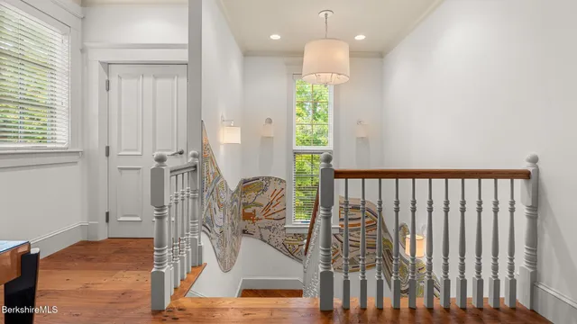 a bed room with a bed and a large window