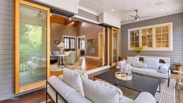 a kitchen with stainless steel appliances granite countertop a stove and more cabinets