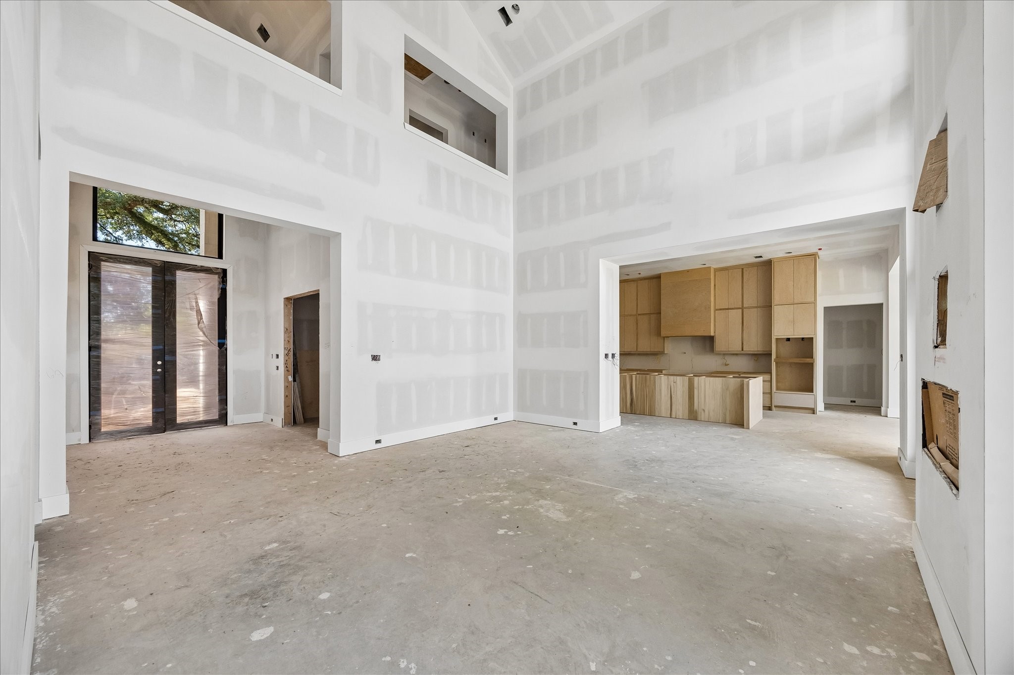 9050 Elizabeth Road Houston, TX 77055 - Photo 7 of 40 a view of an empty room with a fireplace and a window