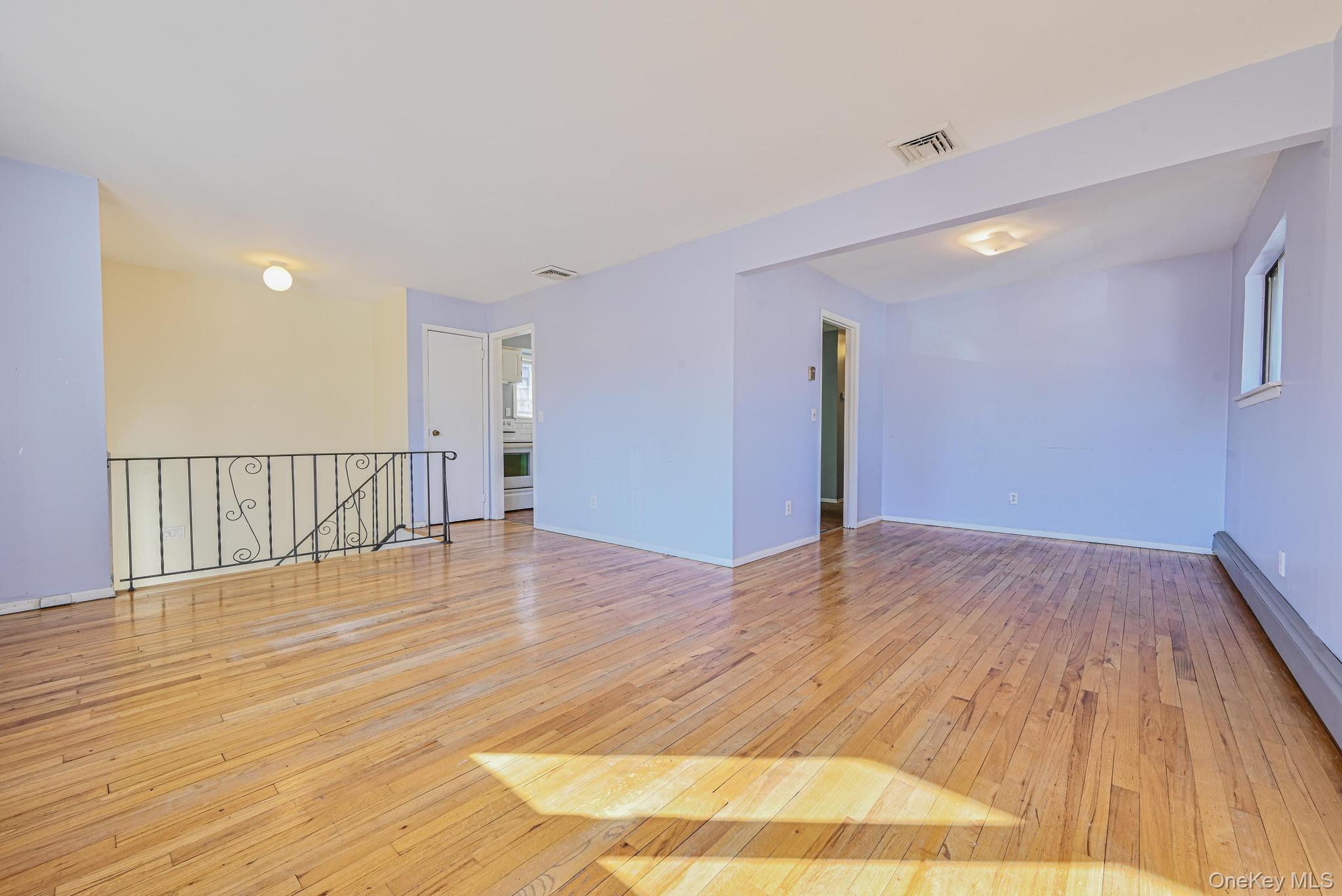 3 Healy Street Huntington, NY 11743 - Photo 4 of 20 a view of a room with wooden floor
