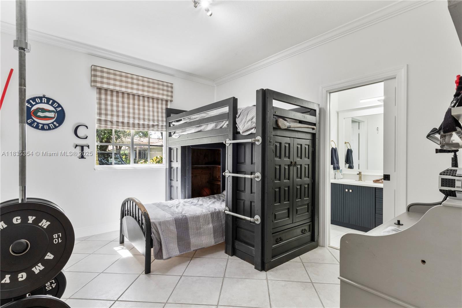 12530 Southwest 96th Court Miami, FL 33176 - Photo 12 of 21 a bedroom with furniture and a window