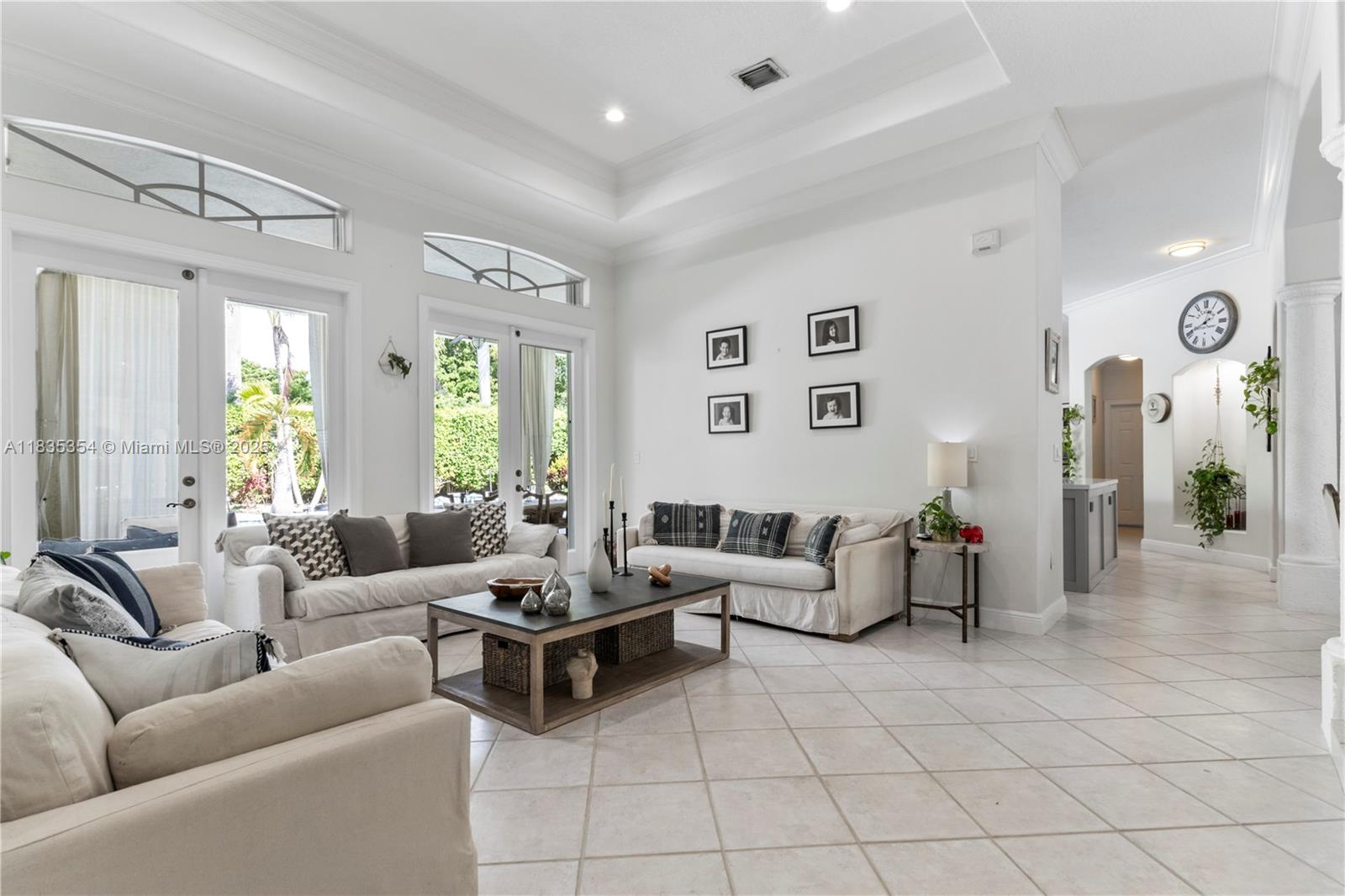12530 Southwest 96th Court Miami, FL 33176 - Photo 2 of 21 a living room with furniture and wooden floor