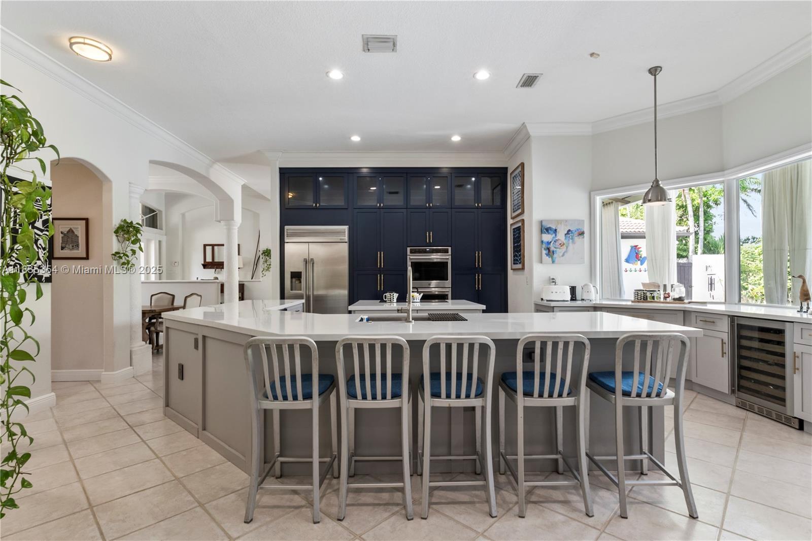12530 Southwest 96th Court Miami, FL 33176 - Photo 5 of 21 a dining hall with stainless steel appliances a table and chairs